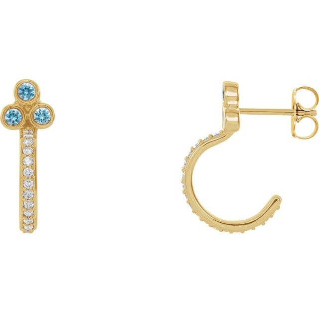 Creoler i 14 kt gult gull med diamant og blå zirkon, 0,25 ct totalt, rund sten 2 mm (par) fra Smykke24